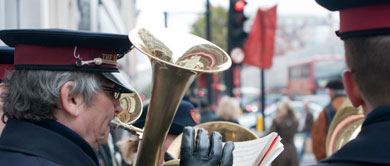 Musicians playing brass instruments outdoors
